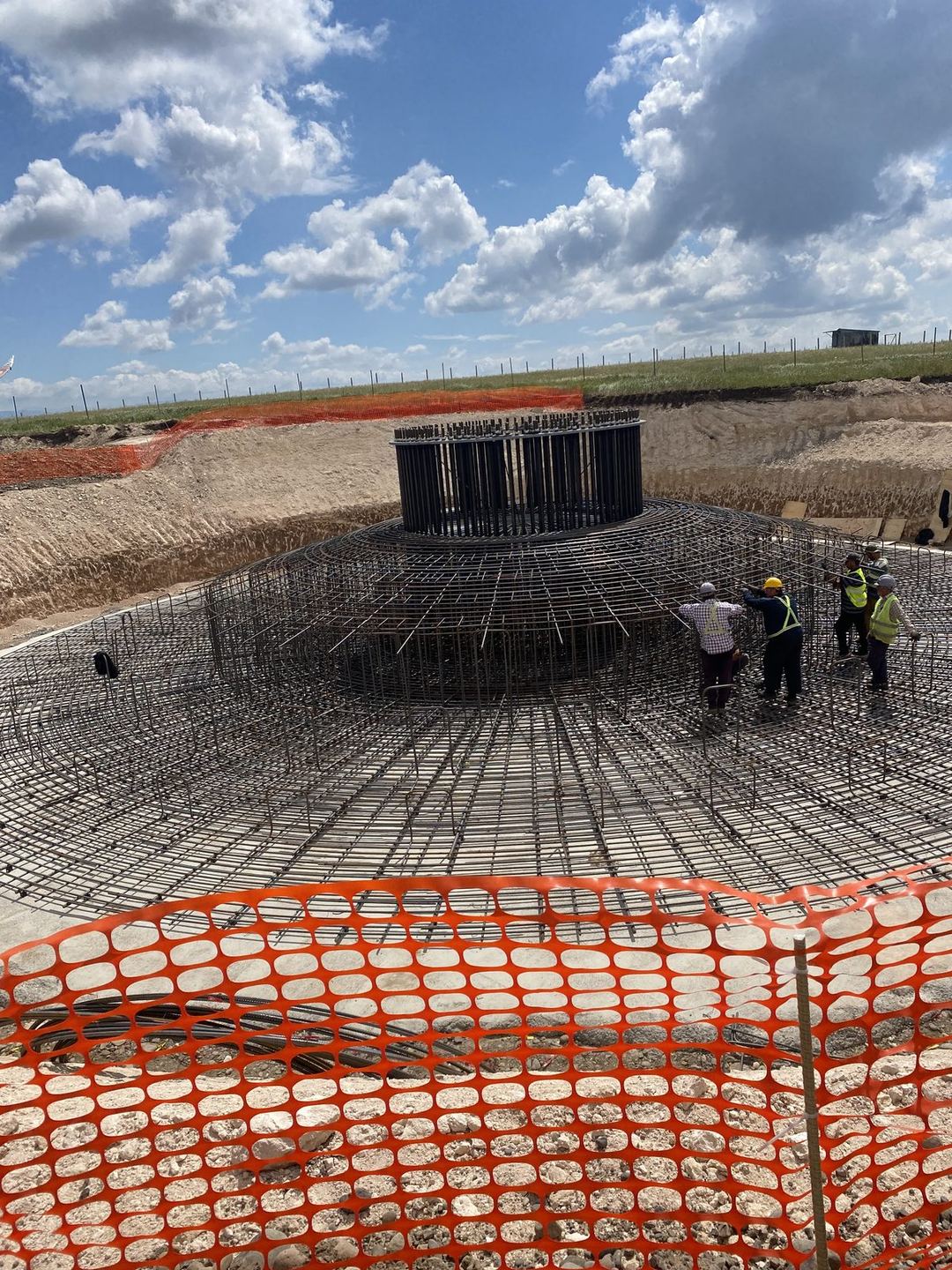Wind turbine foundation rebar cage with engineering team